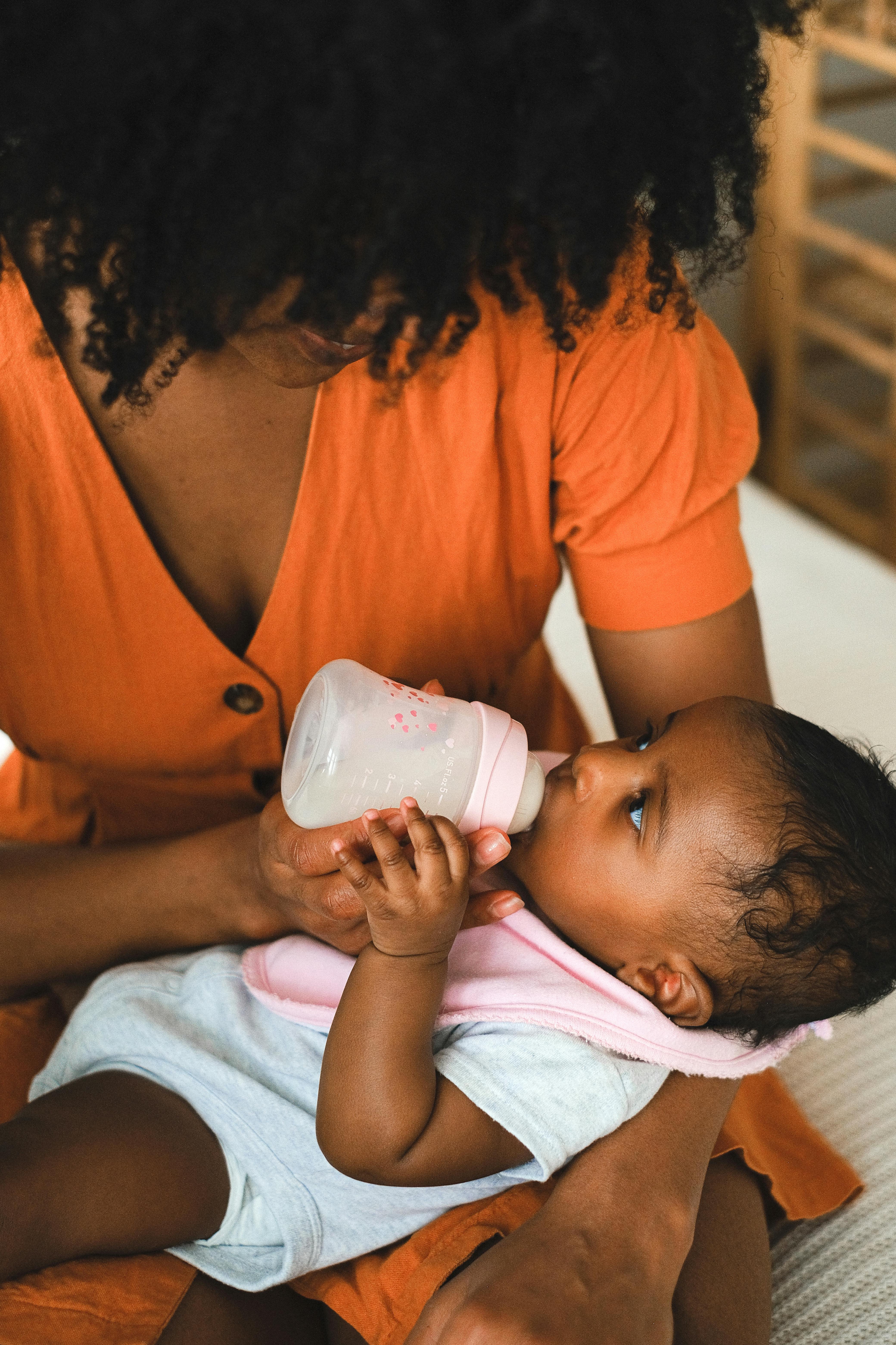 Mother breastfeeding newborn