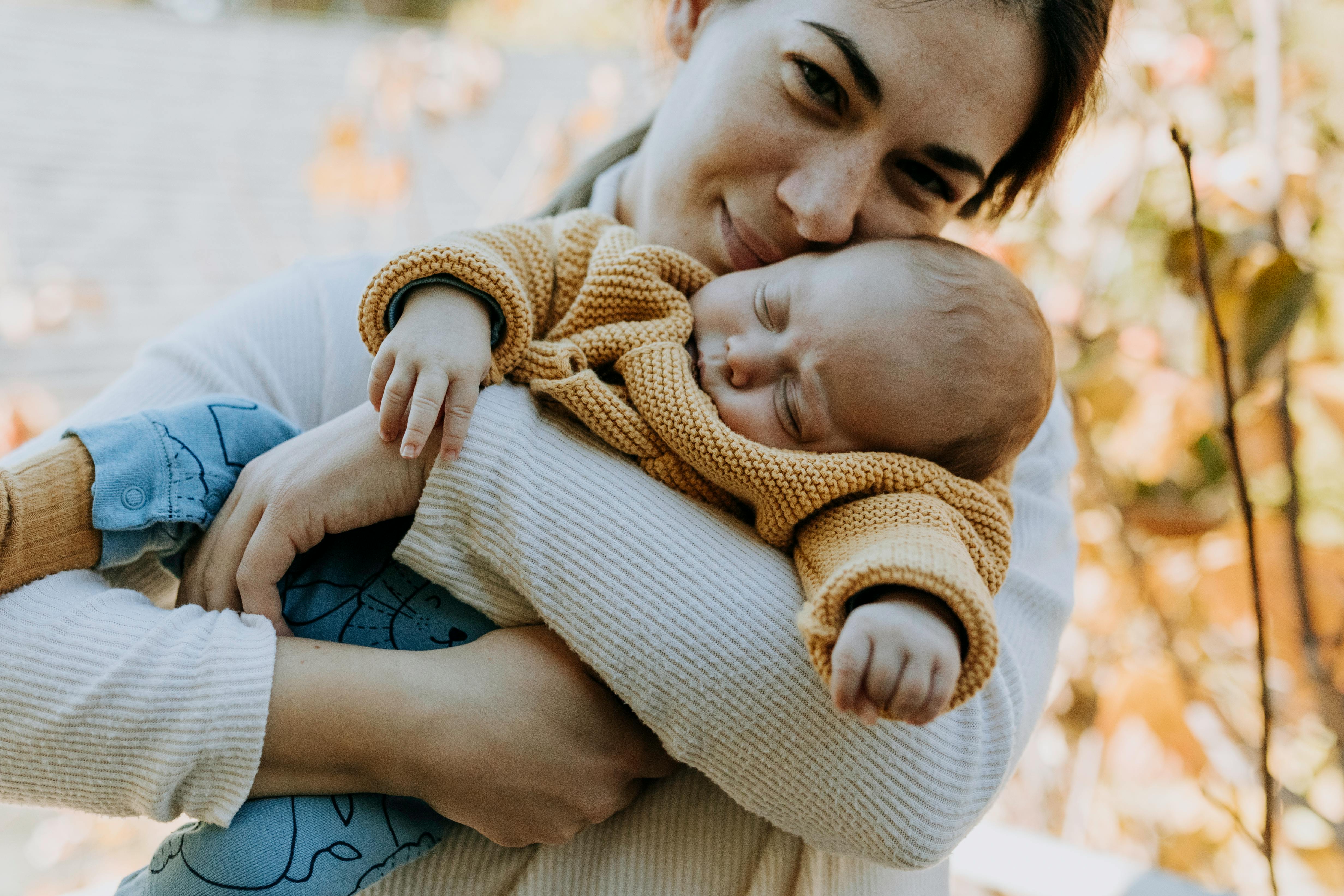 Mother holding newborn baby